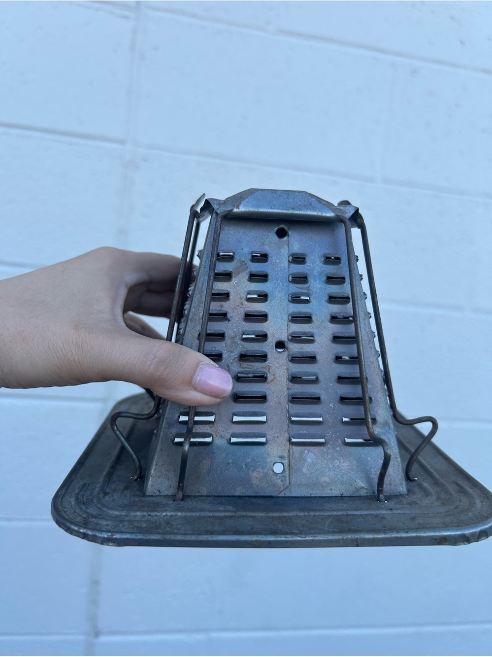vintage four-sided stovetop or camp toaster,